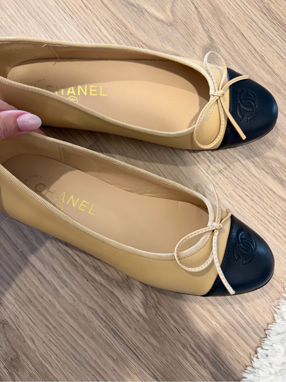 Beige Leather Ballet Flats with Black Cap Toe